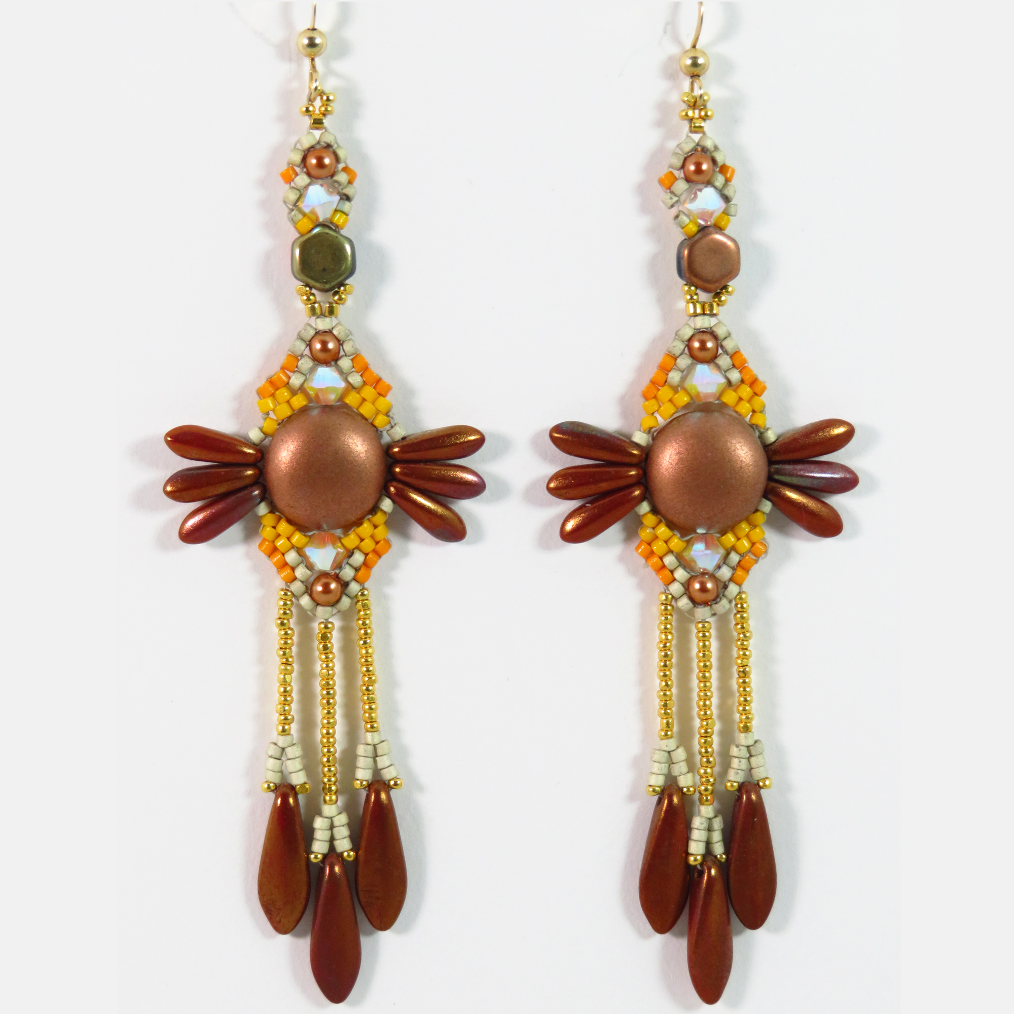 Copper Mayan style feathered earrings by Bonnie Van Hall